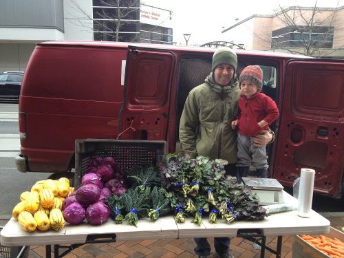 Felix & Jason at our "rogue market" last winter. How we miss those greens now!
